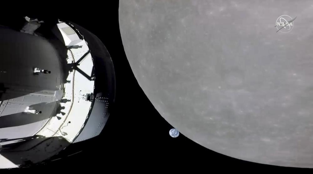 NASA's Orion capsule passes dark side of the Moon