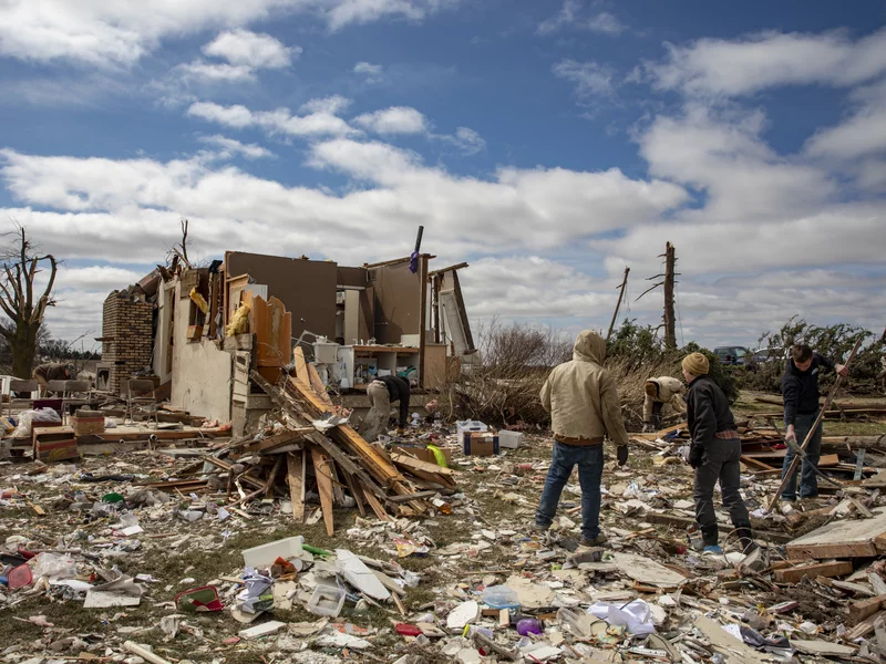 A daunting recovery begins in the South and Midwest after tornadoes kill at least 26